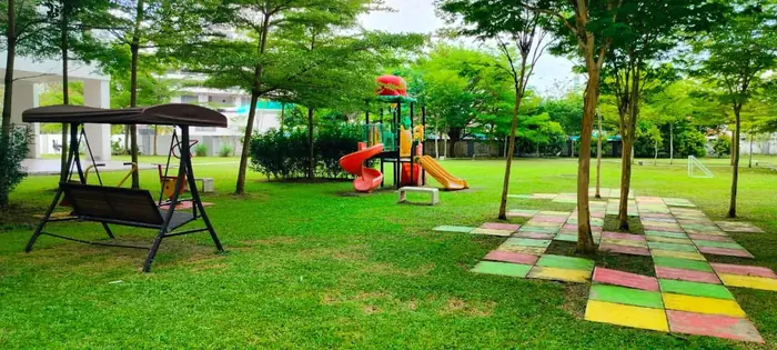 The playground and gardens in the grounds