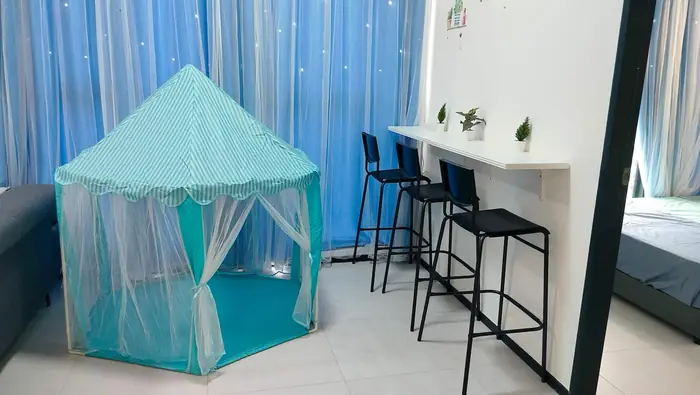 A play tent in the living room at Ocean Home