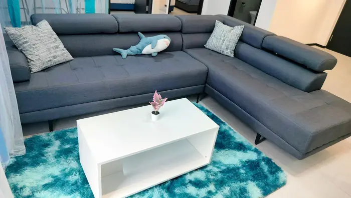 The corner sofa and coffee table at Ocean Home